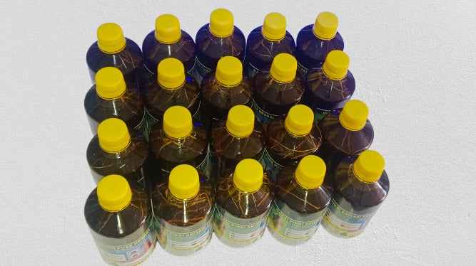 Herbal hair oil bottle Karnataka 