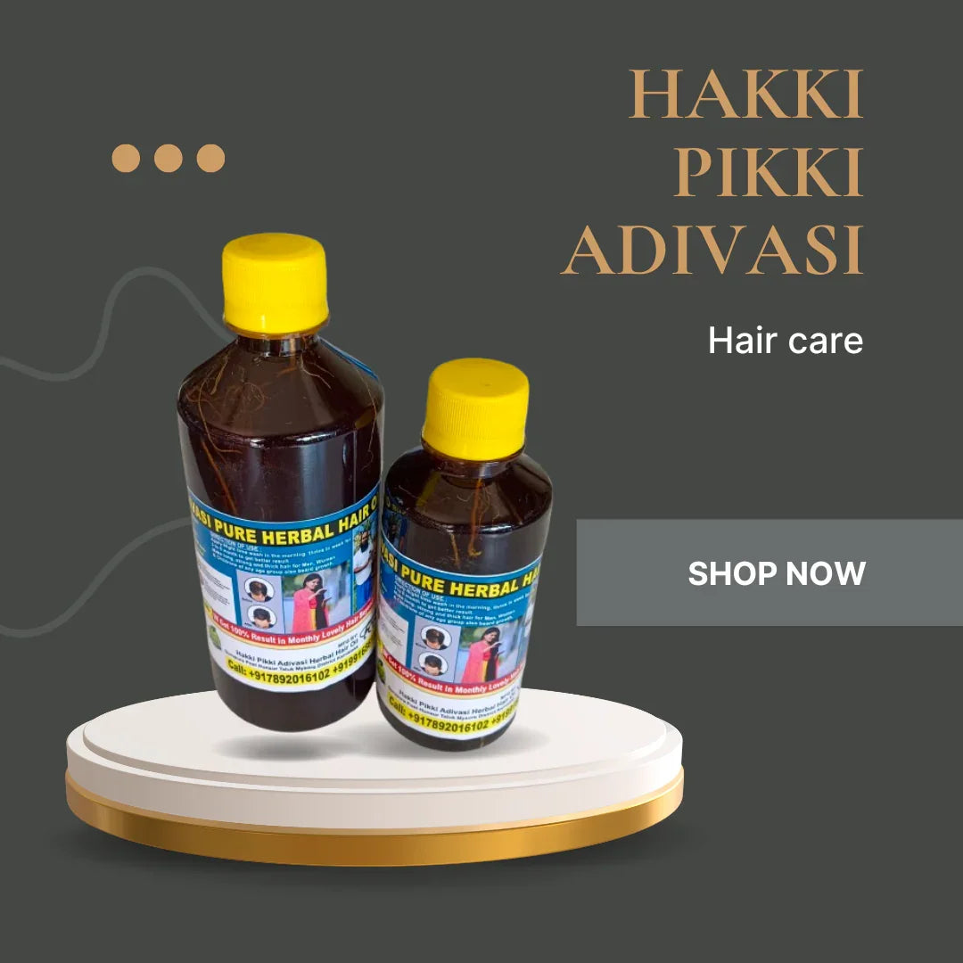 Hakki Pikki Adivasi herbal hair growth oil in two bottles with yellow caps on pink background